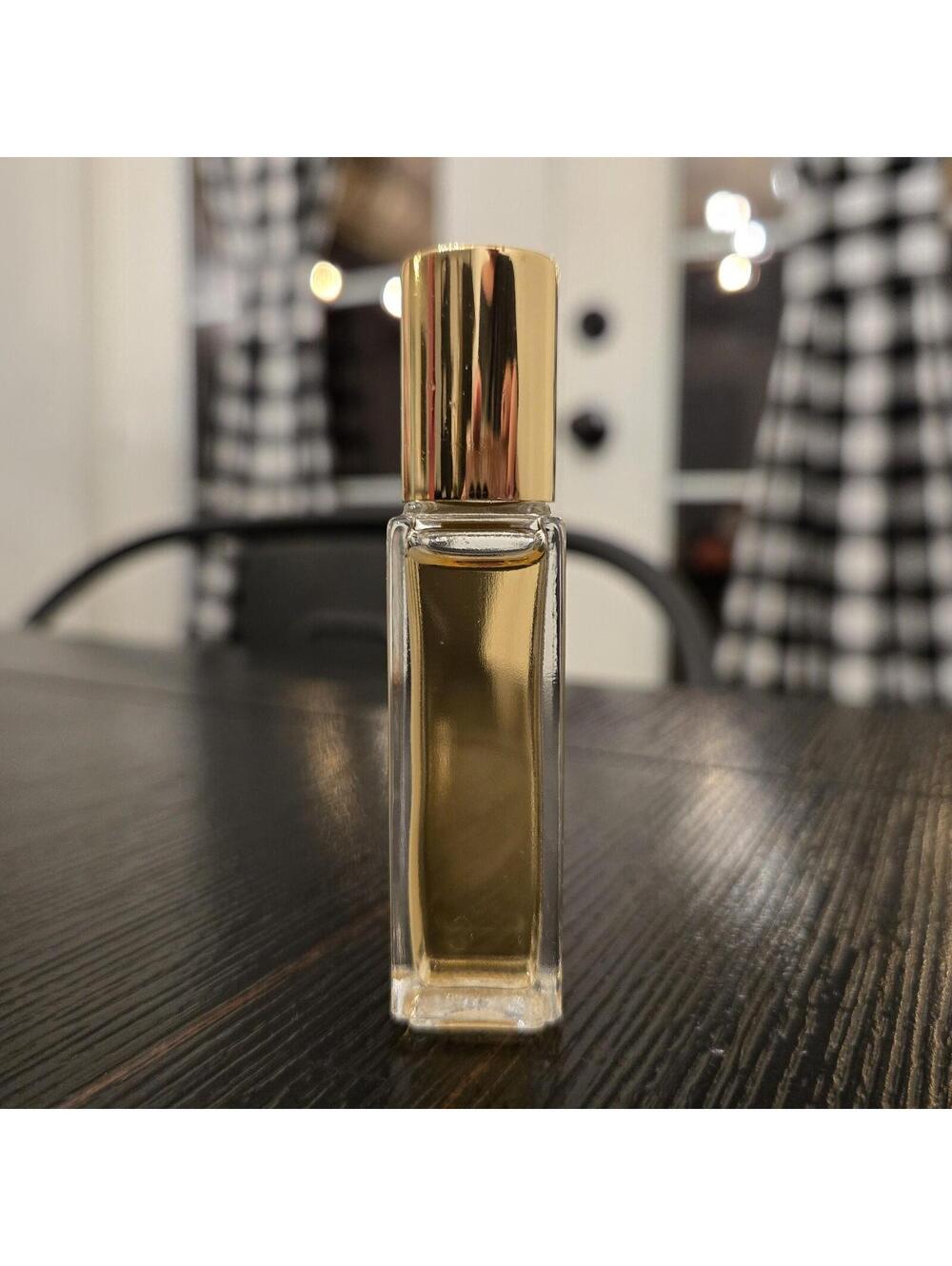 Elizabeth and James Nirvana Black Rollerball 0.24 oz Perfume Travel Size - Picture 3 of 5